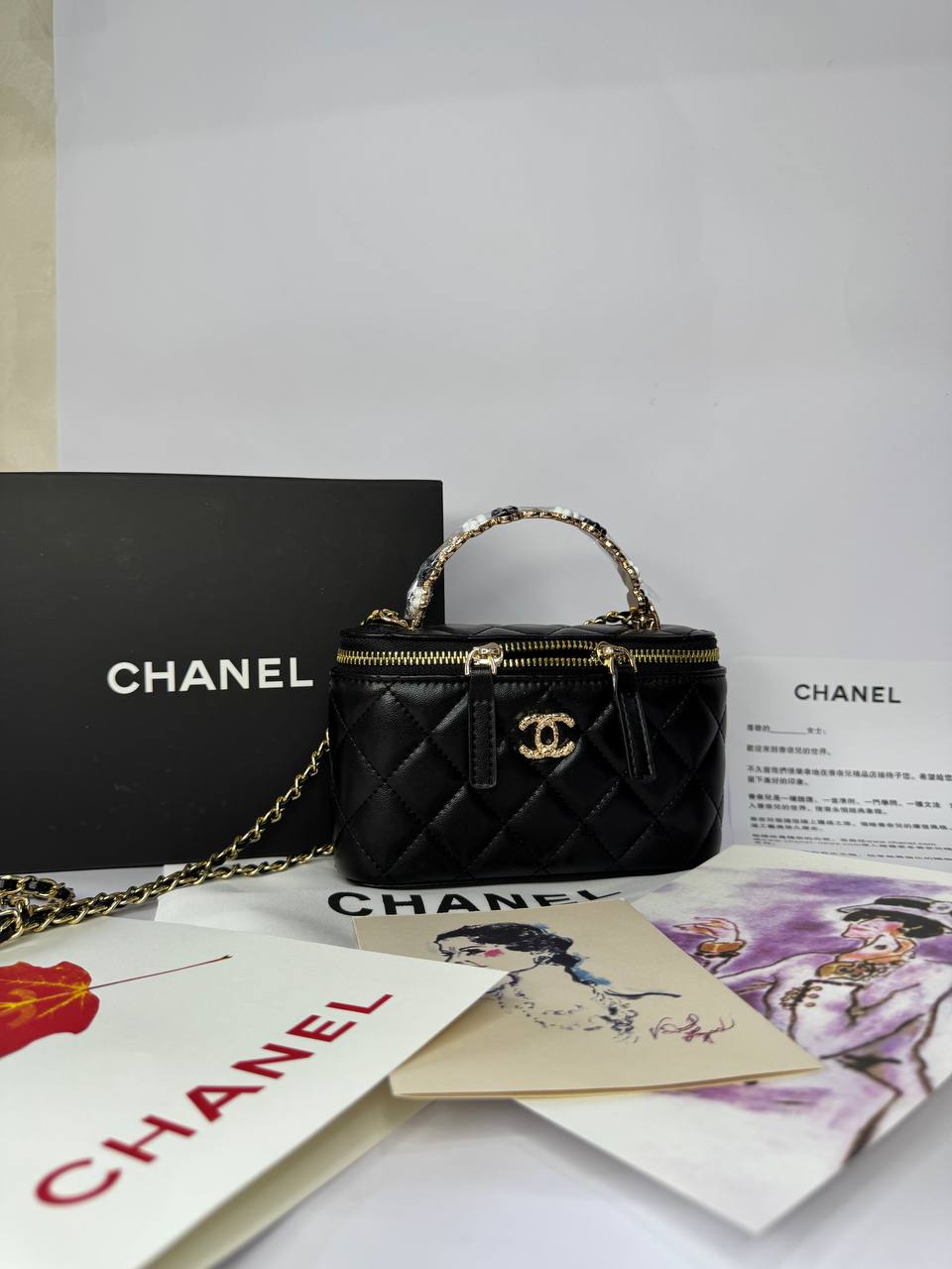 Chanel lambskin vanity mini with top handle